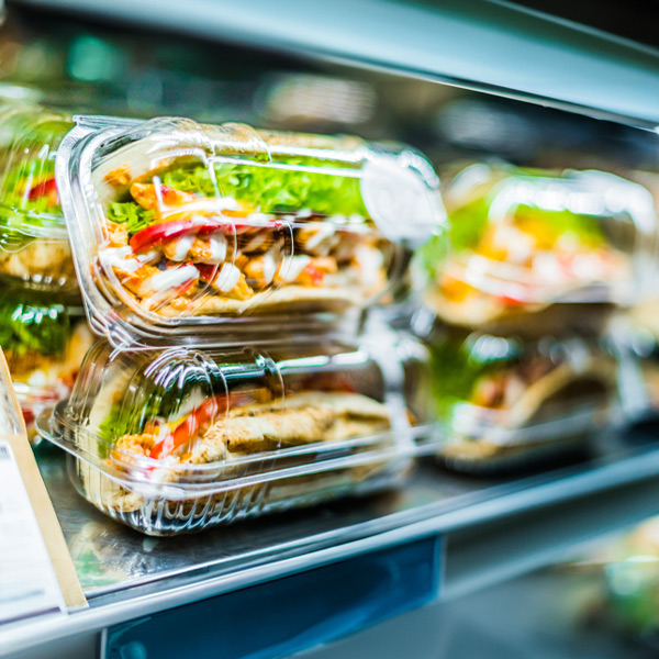 Fresh sandwiches and salads in a refrigerated micro-market case